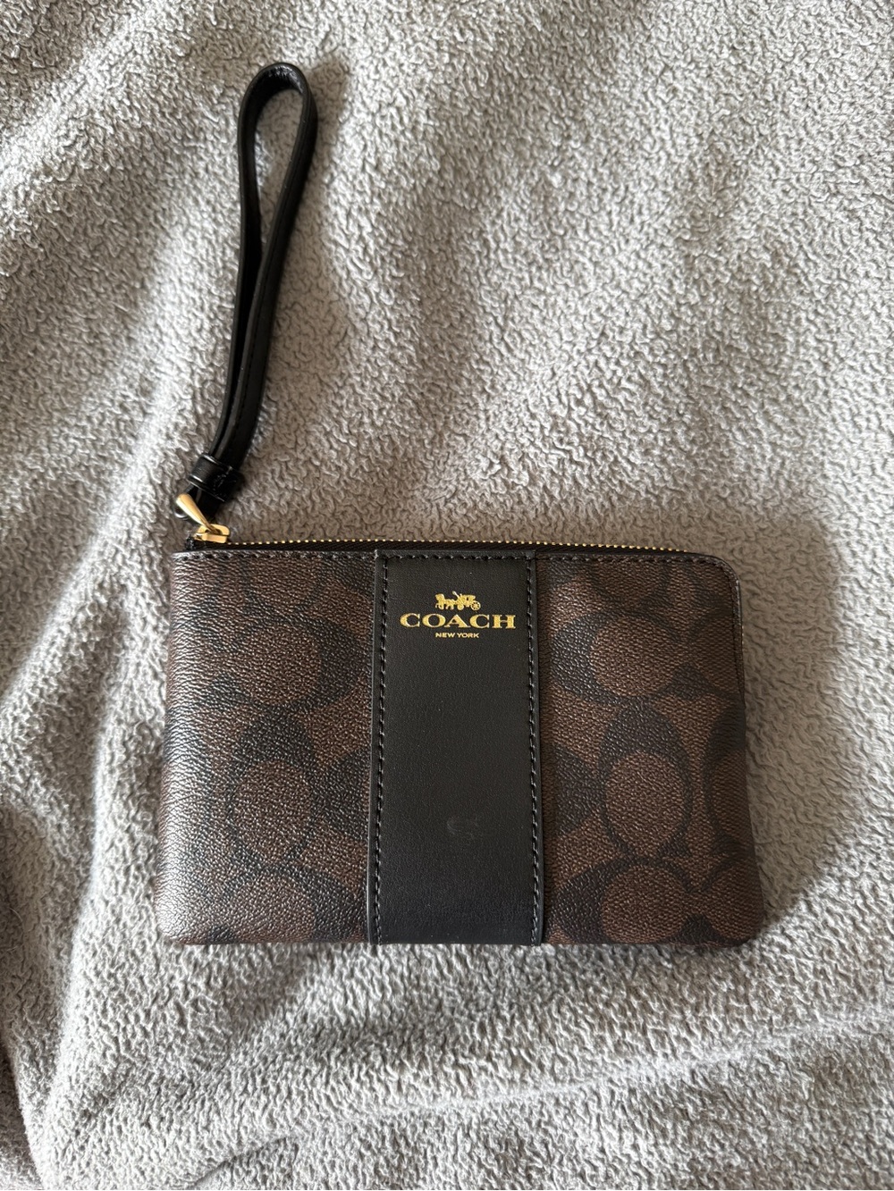 COACH Brown Signature Wristlet with Black Center Stripe